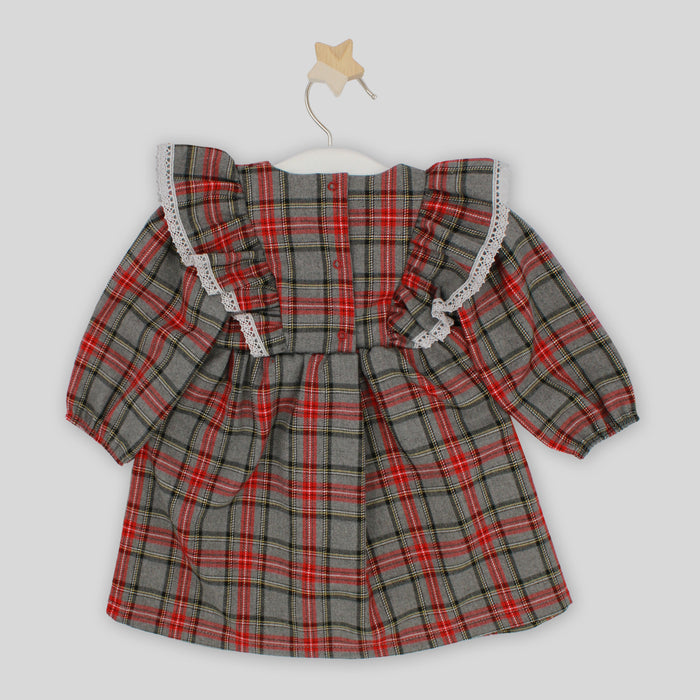 Plaid dress with ruffled sleeves on a white background