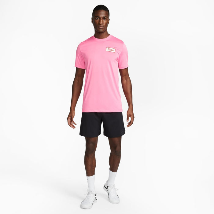 Nike Dri-FIT Fitness T-Shirt in bright pink with a lightweight fabric and logo detail on the chest, front view.