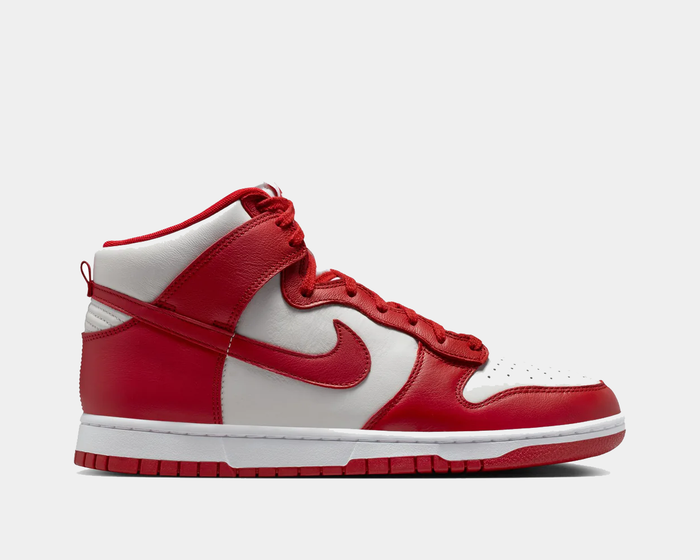 Nike Dunk High Retro SE high-top sneakers in white and red with leather upper, perforated toe box, and red laces, side view.