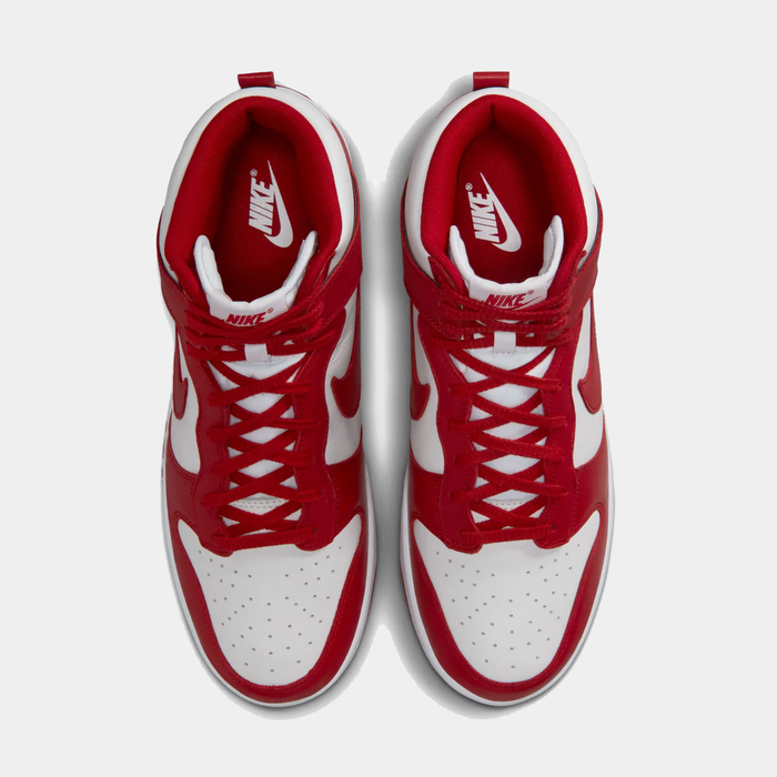Nike Dunk High Retro SE sneakers in red and white with leather upper and perforated toe box, top view.