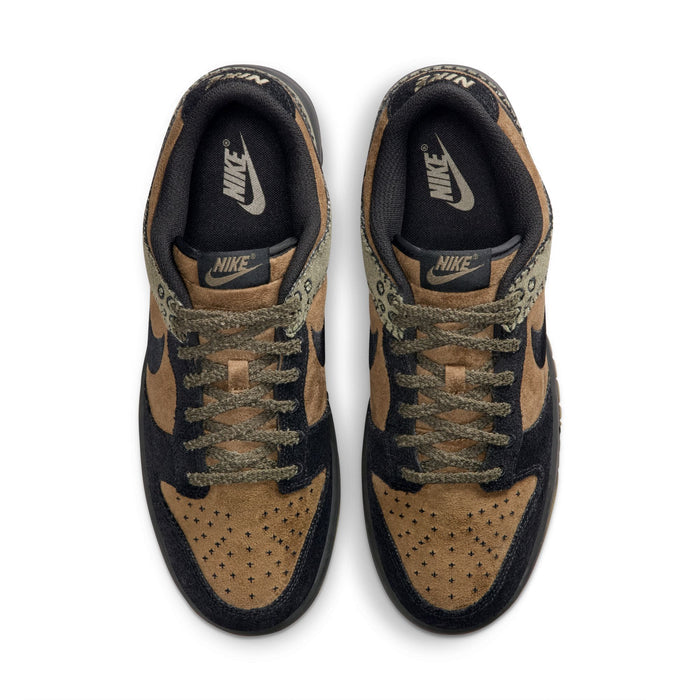 Nike Dunk Low Retro sneakers in brown and black with perforated suede toe box and textured laces, top view.