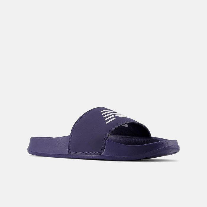 New Balance DynaSoft 200v2 sandals in dark purple with a contoured footbed and white logo on the strap, angled side view.