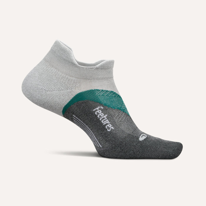 Feetures Elite Light Cushion No Show Tab socks in gray and green with seamless toe and targeted compression, side view.
