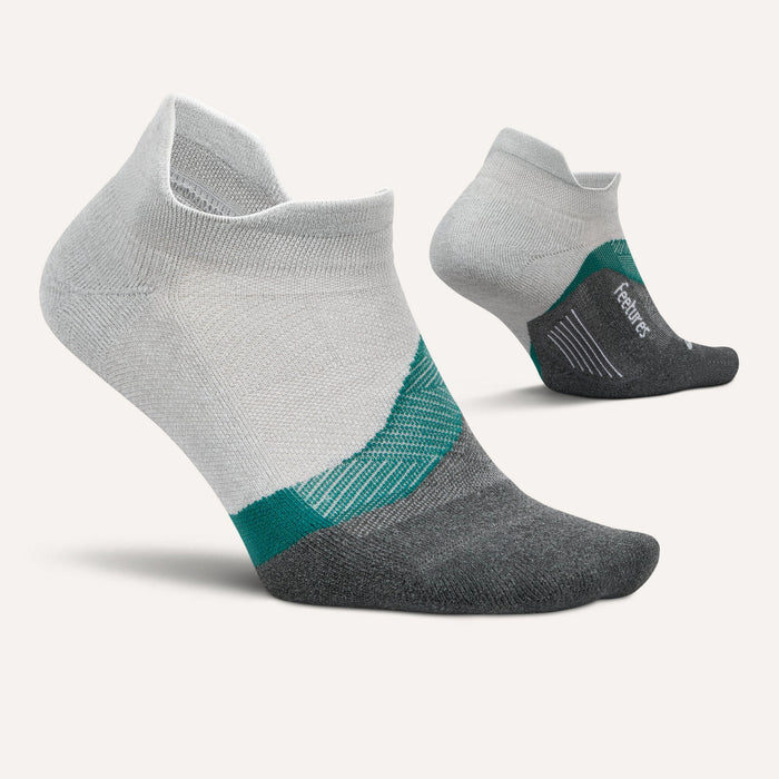 Feetures Elite Light Cushion No Show Tab socks in white, gray, and green with arch support, side view.
