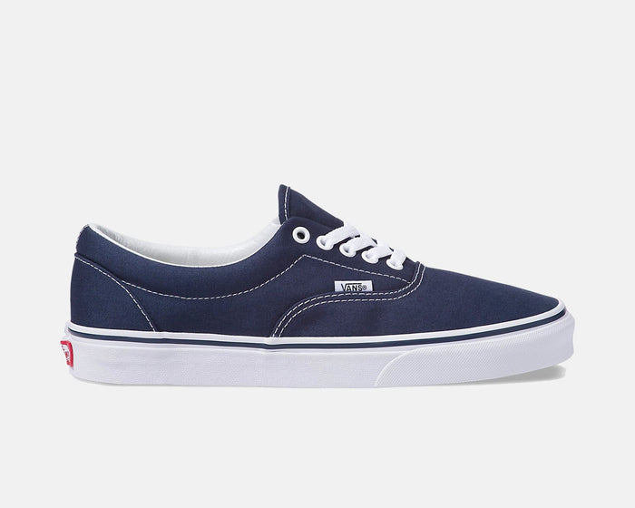 Vans Era Core sneakers in navy blue canvas with white stitching and laces, side view.