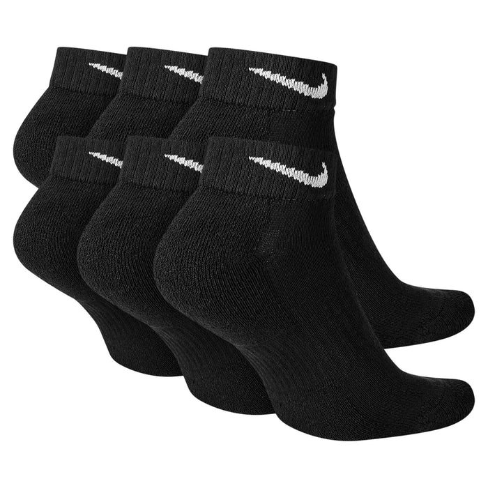 Nike Everyday Cushion Low Socks in black with ribbed cuffs and white Nike logo, side view showing pack of six pairs.
