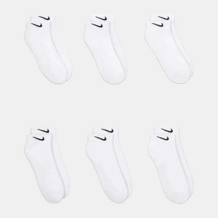Nike Everyday Cushion Low Socks in white with black Nike logo, featuring soft fabric and cushioned soles, front view.