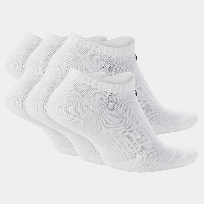 Nike Everyday Cushioned Training No-Show Socks in white with ribbed texture and reinforced heel and toe, angled side view.