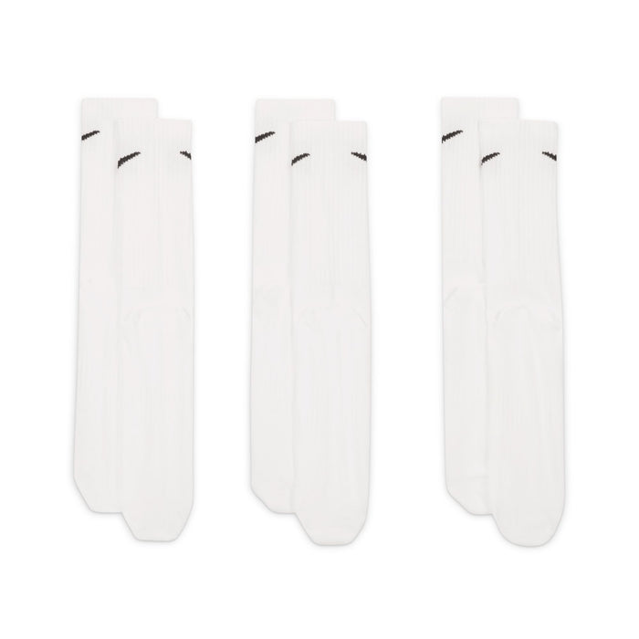 Nike Everyday Lightweight Crew Socks, white with ribbed construction and black swoosh logo, front view of three pairs.