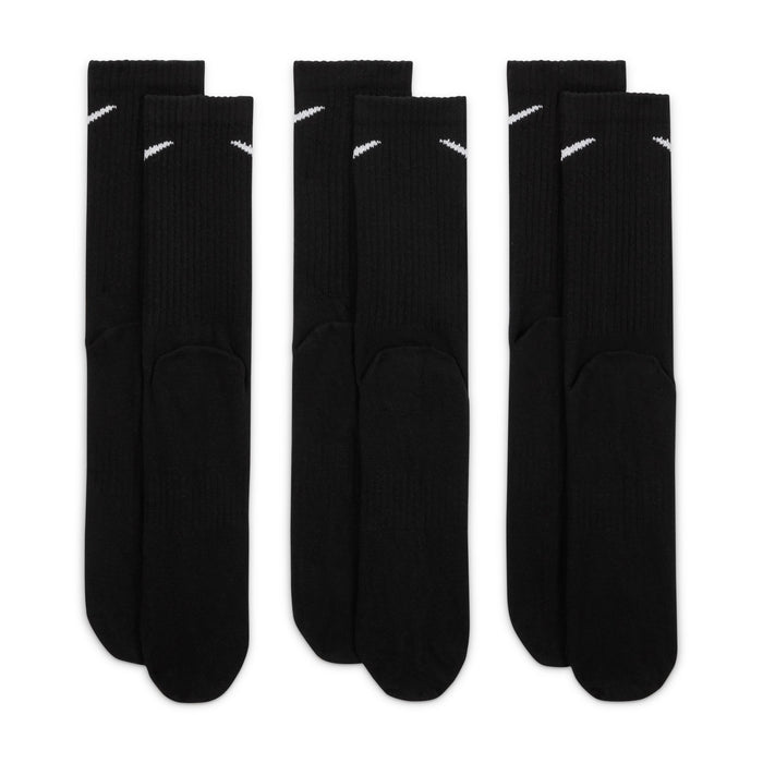Nike Everyday Lightweight Crew Socks in black with white swoosh logo, ribbed cuffs, and soft lightweight fabric, front view.