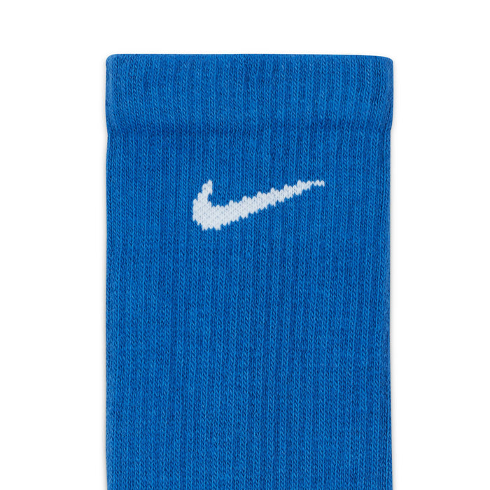 Nike Everyday Plus Cushioned Training Crew Socks in blue with white Nike swoosh logo, close-up of ribbed cuff.