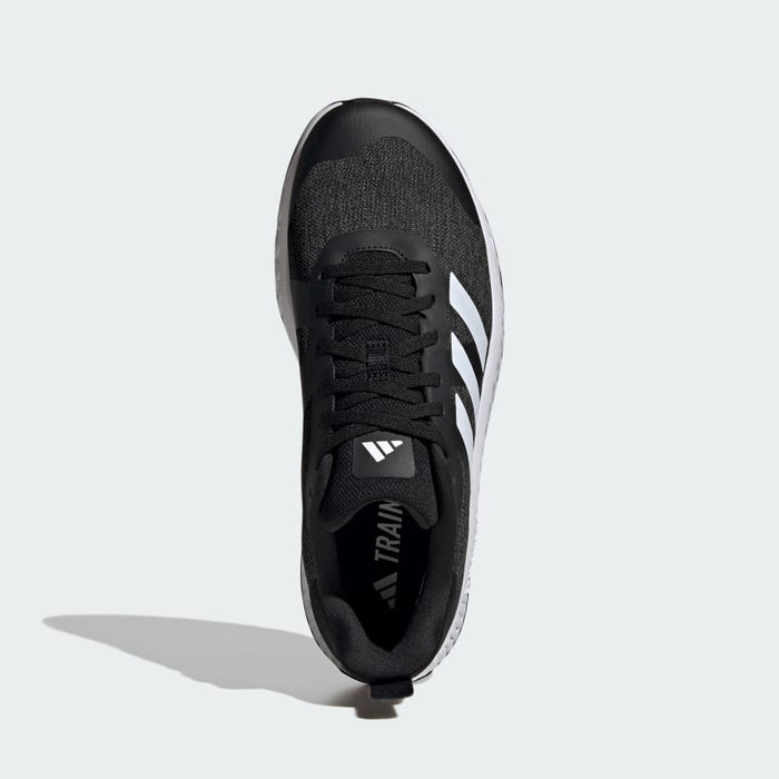 Adidas Everyset Trainer shoes top view, featuring black mesh upper, white stripes on the side, and lace-up closure.
