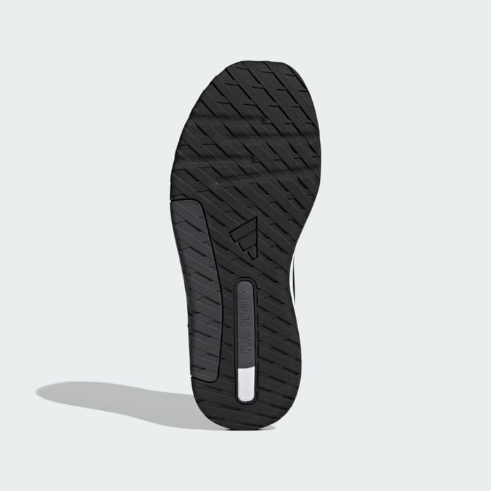 Adidas Everyset Trainer outsole in black rubber featuring Dual Density cushioning and textured traction grooves.