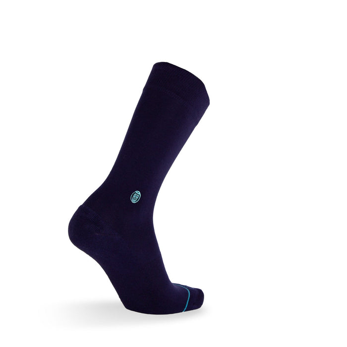 Tall Order Extra Cushioned Dress Socks in navy blue with light blue detailing and reinforced toe, side view.
