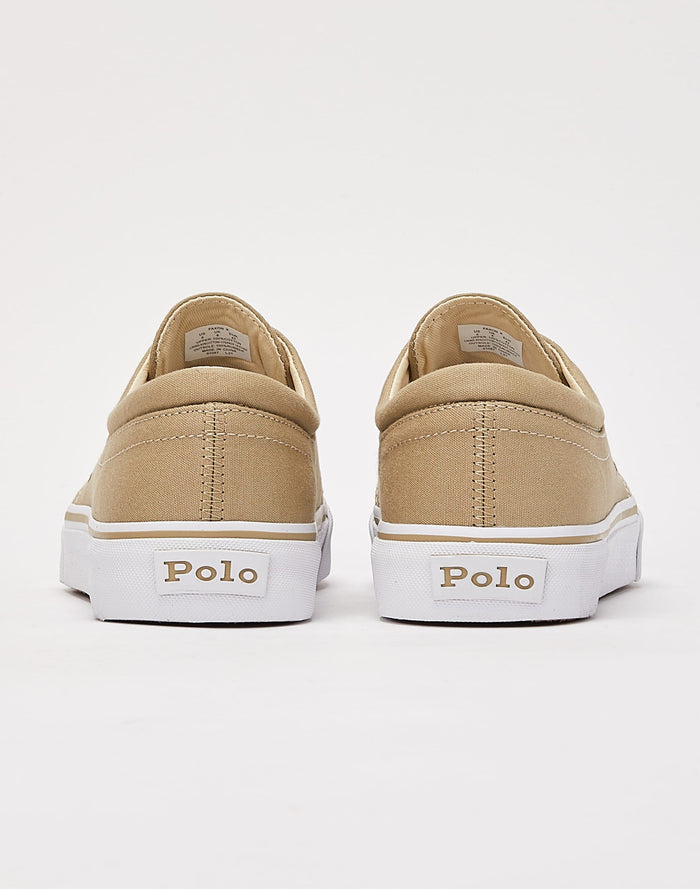 Polo Ralph Lauren Faxon X Canvas sneakers in beige canvas with white rubber outsole, back view showing heel branding.