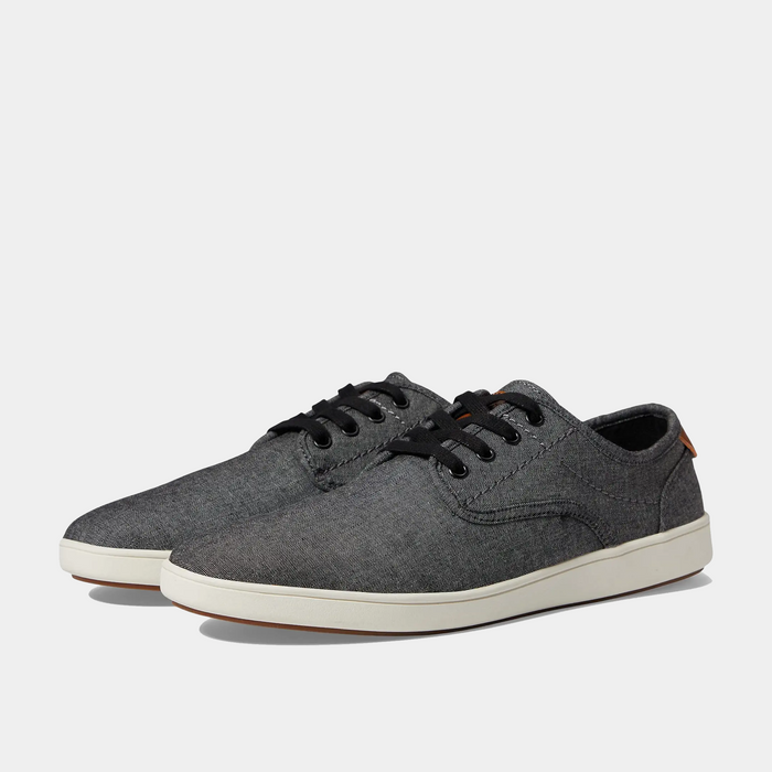 Steve Madden Fenta casual shoes in gray canvas with black laces and white rubber sole, angled front-side view.