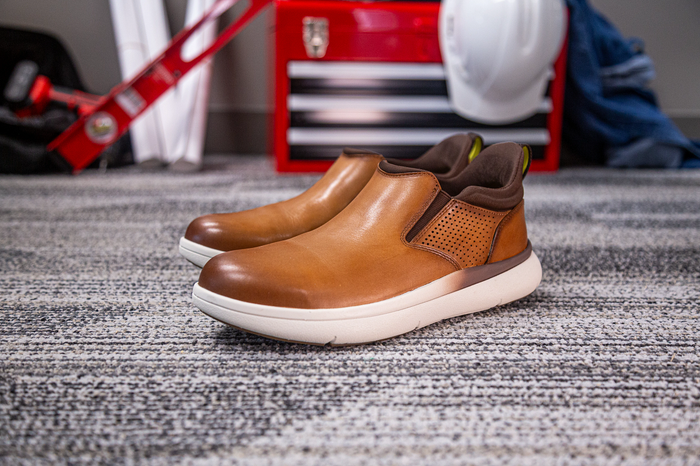 Florsheim Work Fleet Work Comp Toe Slip On shoes in tan leather with slip-on design and perforated side panels, side view.