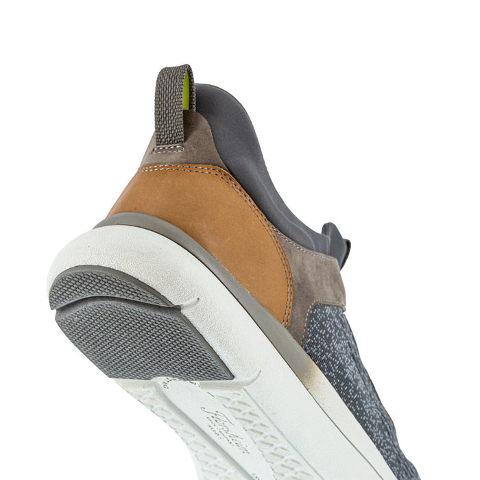 Florsheim Work Fleet Work Comp Toe Sneaker in gray and brown with textured leather accents and white outsole, back view.