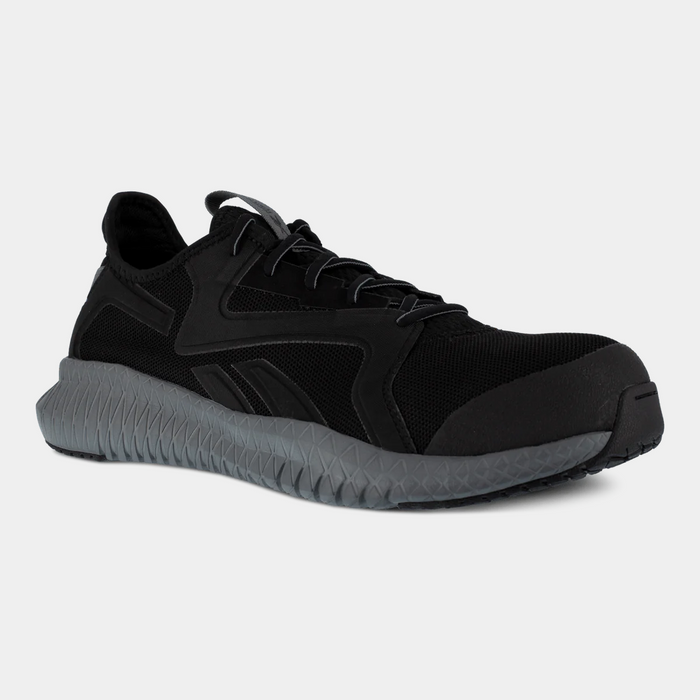 Reebok Work Flexagon 3.0 work shoes in black with breathable mesh upper and slip-resistant gray outsole, angled front-side view.