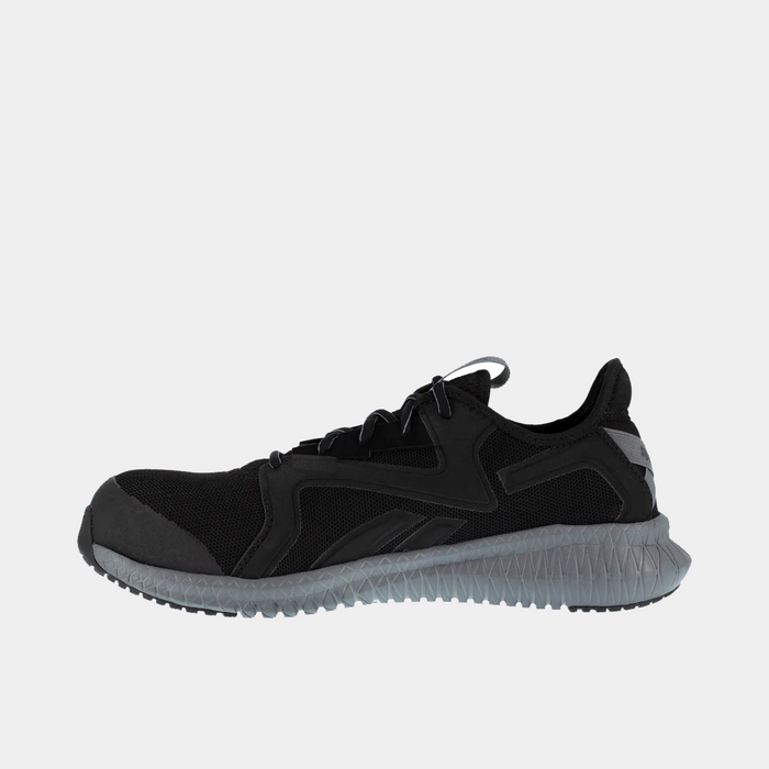 Reebok Work Flexagon 3.0 shoes in black with mesh upper and textured gray sole, side view showing sleek design.