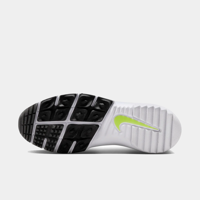 Nike Free Golf Next Nature shoe outsole showing black traction pattern and white base with lime green Swoosh logo.