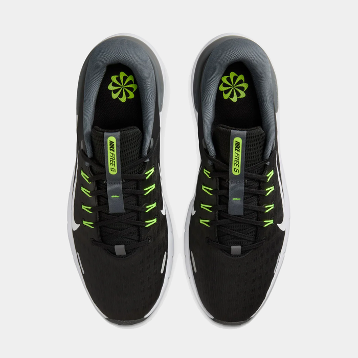 Nike Free Golf Next Nature golf shoes in black with neon green accents, gray inner lining, and white outsole, top view.