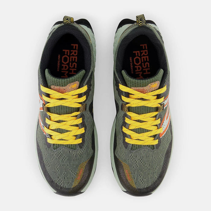 New Balance Fresh Foam Hierro v7 trail running shoes in olive green with yellow laces, breathable mesh upper, and top view.
