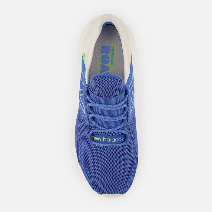 New Balance Fresh Foam Roav running shoes with blue mesh upper, green accents, and lace-up closure, top view.