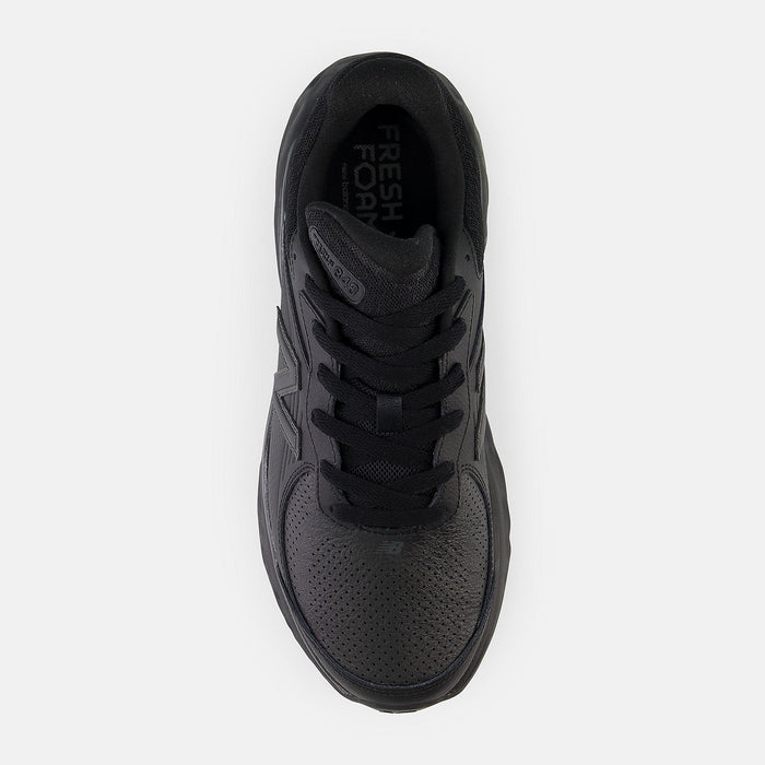 New Balance Fresh Foam X 840F Slip Resistant shoes in black with perforated toe box and lace-up design, top view.