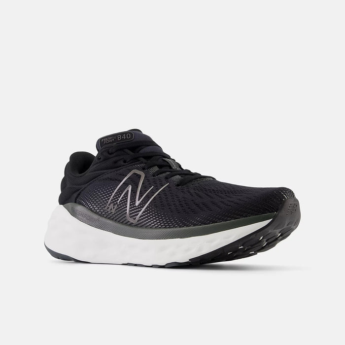 New Balance Fresh Foam X 840v1 running shoes in black with a mesh upper, silver logo accents, and cushioned white midsole, front angle view.
