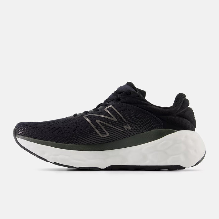 New Balance Fresh Foam X 840v1 running shoes in black with mesh upper, silver logo detailing, and cushioned white sole, side view.