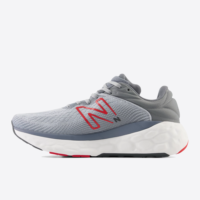 New Balance Fresh Foam X 840v1 running shoes in light gray with red logo, breathable mesh upper, and cushioned white midsole, side view.