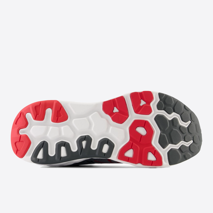 New Balance Fresh Foam X 840v1 running shoes outsole featuring grippy tread pattern in red, white, and gray rubber.