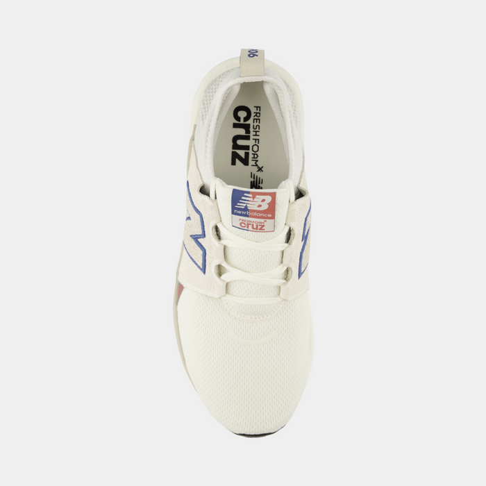 New Balance Fresh Foam X Cruz v3 running shoes in cream with blue logo accents and mesh upper, top view showing lace system and branding.