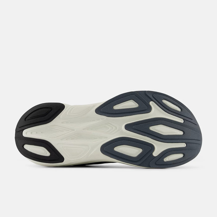 New Balance Fresh Foam X More v6 running shoes outsole with rubber tread patterns in gray and white, bottom view.