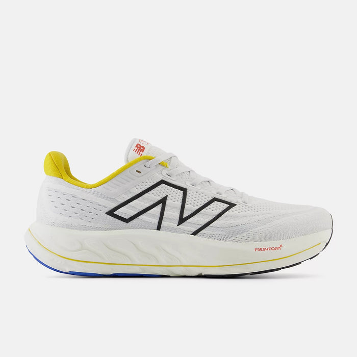 New Balance Fresh Foam X Vongo v6 running shoes in white with yellow accents, breathable mesh upper, and cushioned midsole, side view.