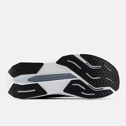New Balance FuelCell Propel v5 running shoes outsole with black rubber tread and gray design accents, bottom view.