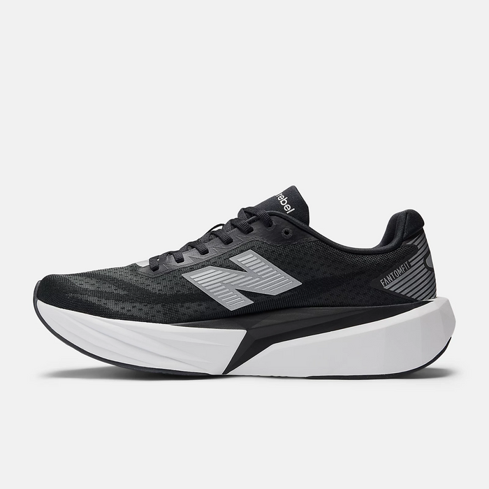 New Balance FuelCell Rebel v5 running shoes in black and gray with mesh upper and thick lightweight midsole, side view.