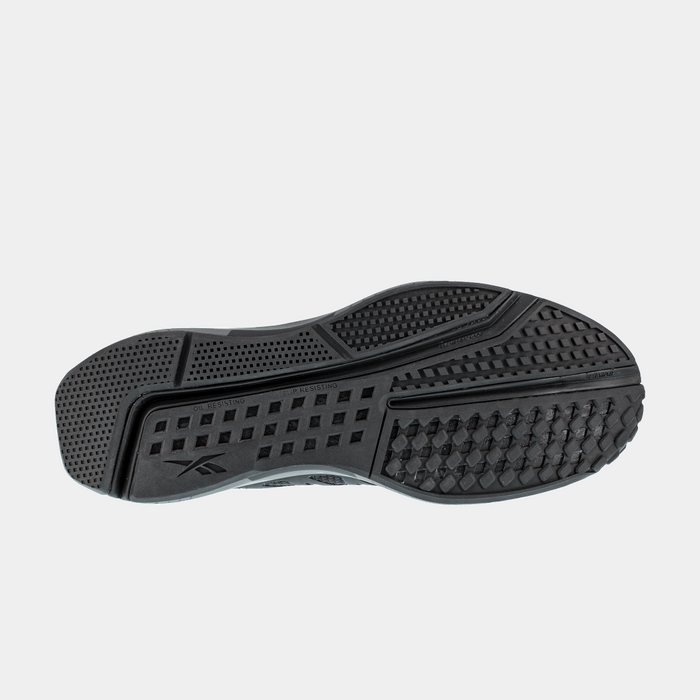 Reebok Work Fushion Flexweave™ Work shoe outsole, black slip-resistant rubber with textured grip pattern, sole/bottom view.
