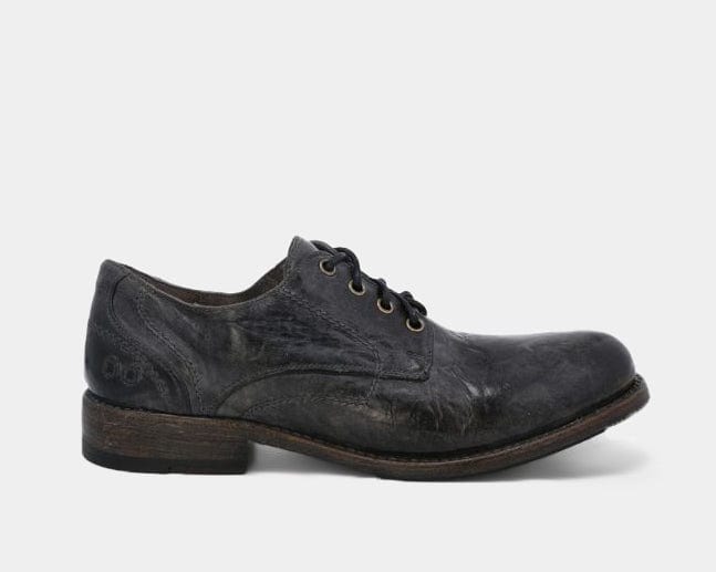Bed Stu Galao oxford shoes in distressed black leather with a low wooden heel and lace-up closure, side view.