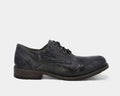 Bed Stu Galao oxford shoes in distressed black leather with a low wooden heel and lace-up closure, side view.