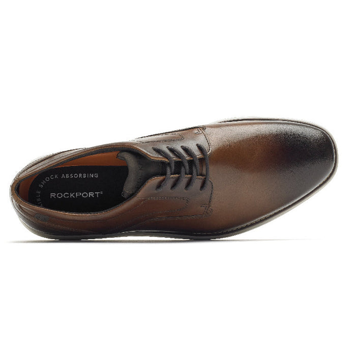Rockport Garett Plain Toe dress shoe in brown leather with cushioned insole, top view showing lace-up design and sleek finish.