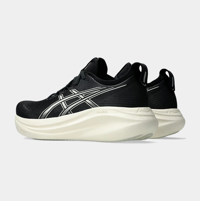 Asics Gel-Nimbus 27 running shoes in black with breathable mesh upper and white cushioning midsole, side view.