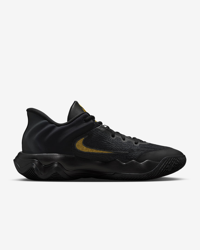 Black sneaker with a gold swoosh logo on a white background
