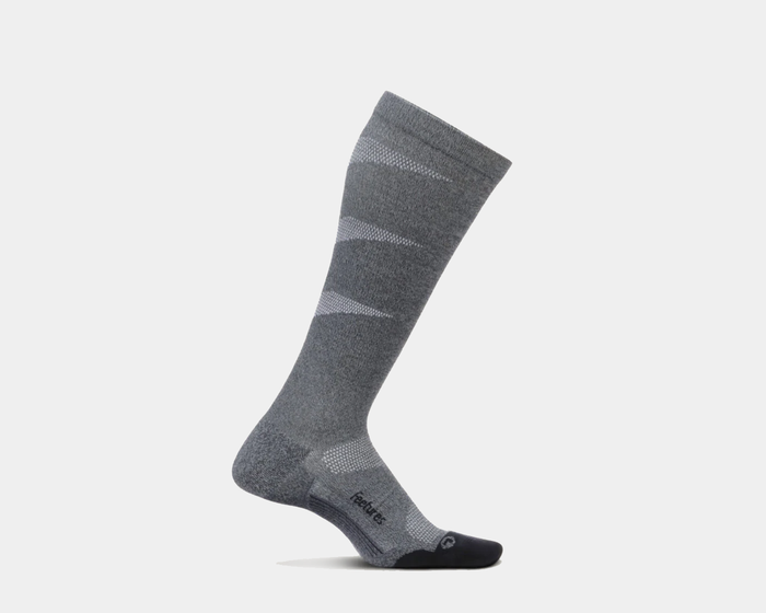 Feetures Graduated Compression Light Cushion Socks in gray and black, knee-high design with light cushioning, side view.