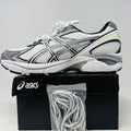 ASICS GT-2160 JJJJound White sneakers with extra laces on a branded box.