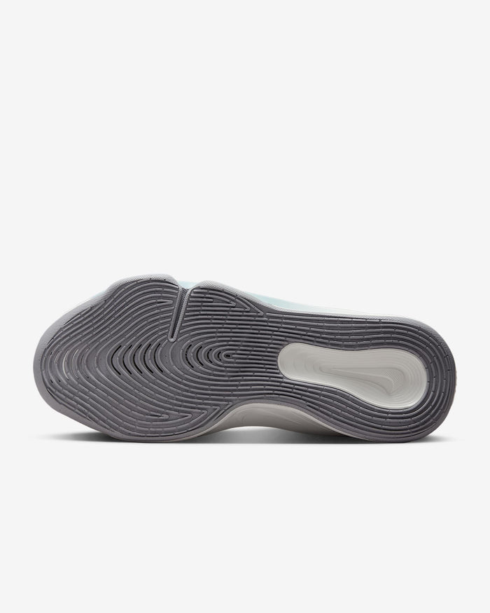 Nike G.T. Hustle 3 basketball shoes outsole with multidirectional traction pattern in gray and white rubber, bottom view.