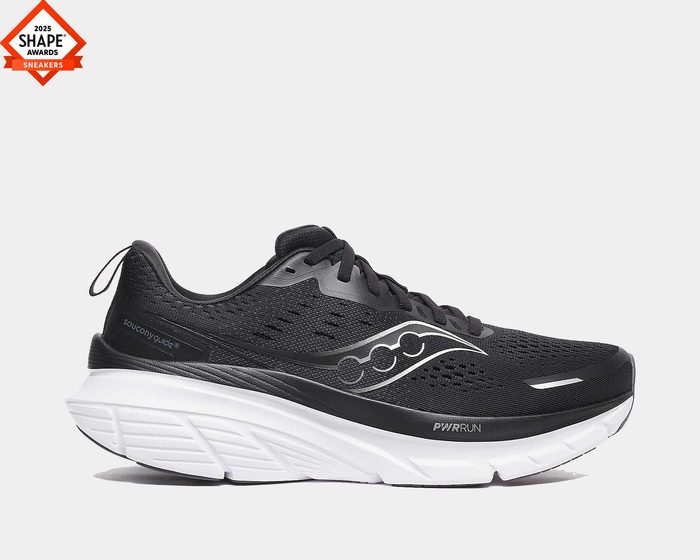 Saucony Guide 18 running shoes in black with breathable mesh upper, PWRRUN cushioning, and white midsole, side view.