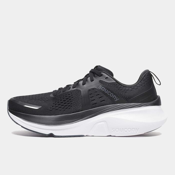 Saucony Guide 18 running shoes in black with engineered mesh upper and white cushioned midsole, side view.