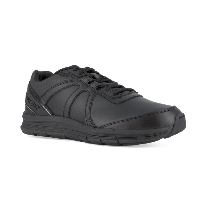 Reebok Work Guide Work shoes in black, featuring a slip-resistant outsole and durable leather upper, side angle view.